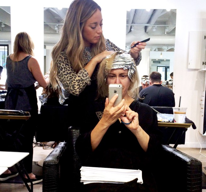 Morgan foiling my hair for step one of my hair transformation.