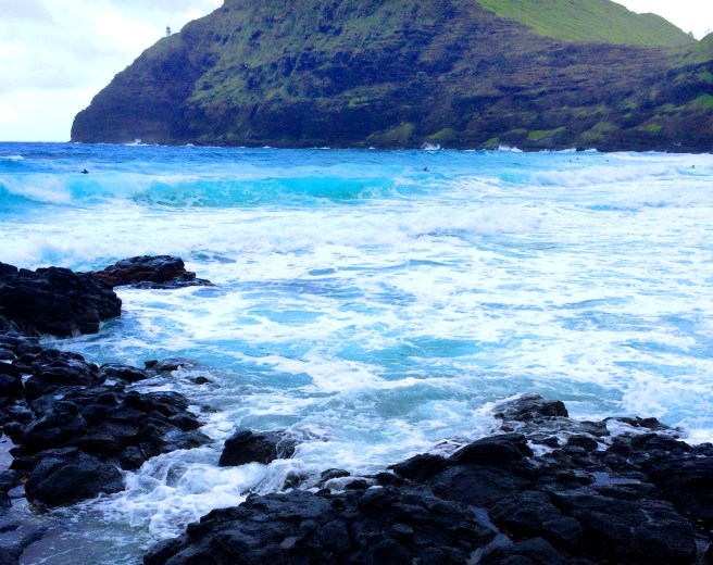 Maks. SO gorgeous the pictures do no justice. Notice the tiny little lighthouse far in the distance. I loved the contrast of black, blue, and green. Heaven on earth. 